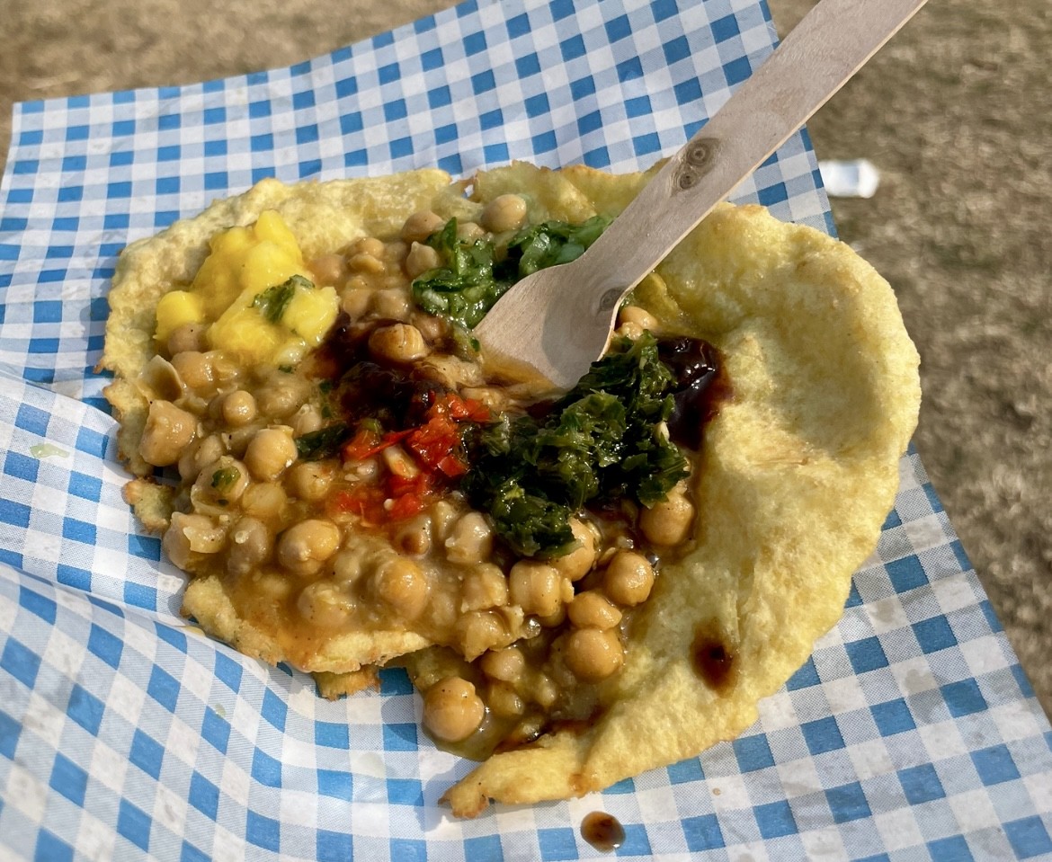 Authentic Trini doubles from Double Trouble food stall at We Out Here Festival 2025, highlighting the diversity of global street food at UK summer festivals.